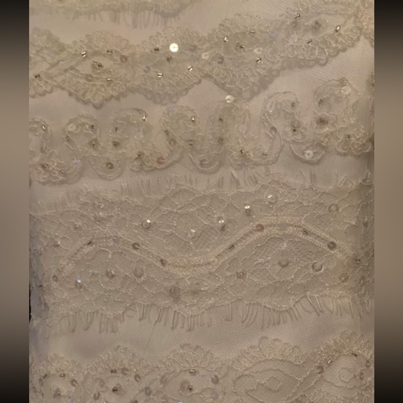 Wedding dress size 10, never worn (for the big day) or altered. - Picture 5 of 7